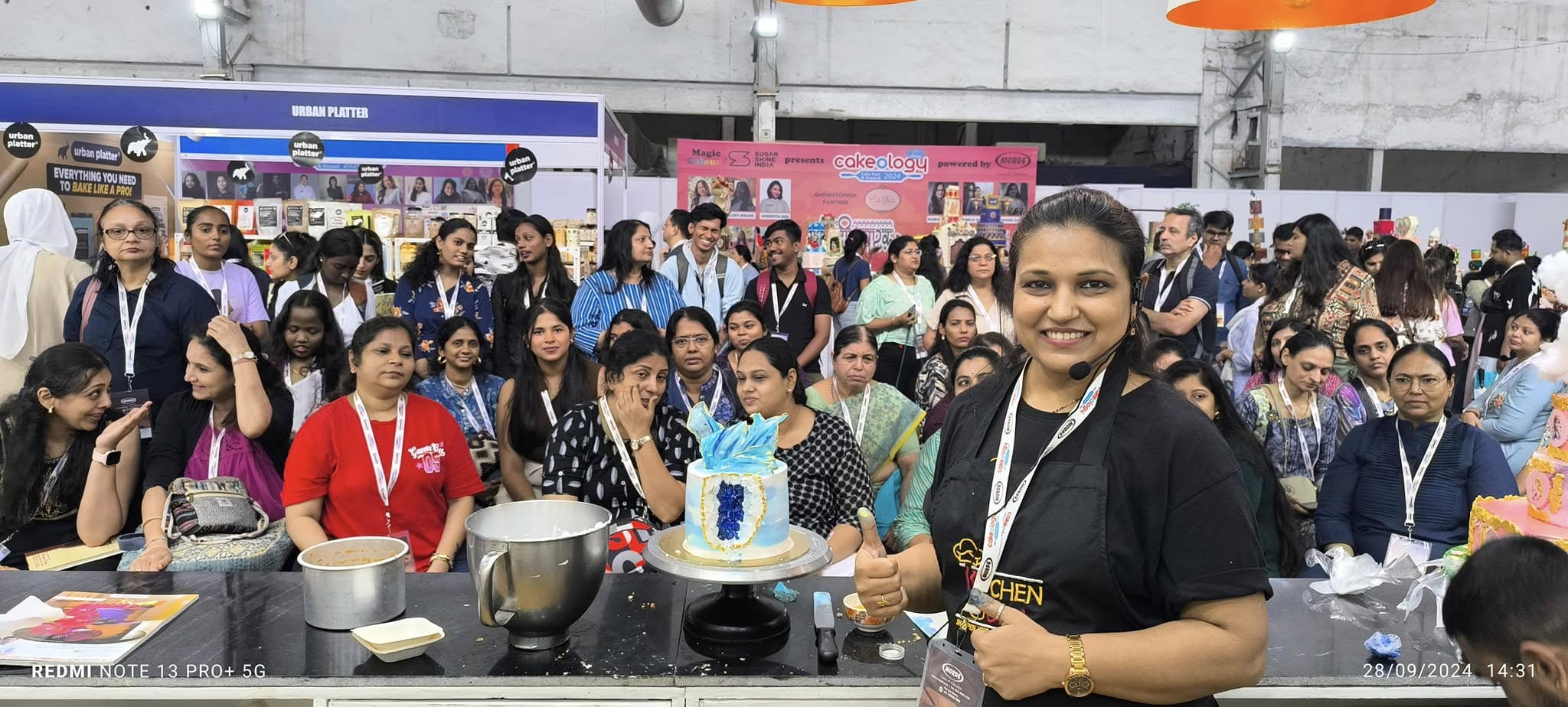 Kitchen Guru trainer during a baking demonstration